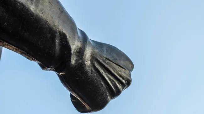 iron fist from statue